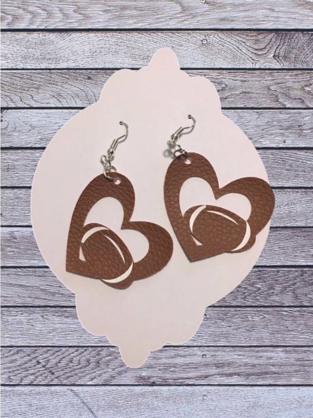 NEW Faux leather heart football earrings